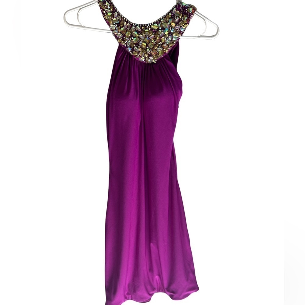 Xtreme formal dress violet size 0 with rhinestones and bedazzled! Unique shape